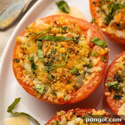 Close up photo of a stuffed tomato on a plate, highlighting the delicious filling