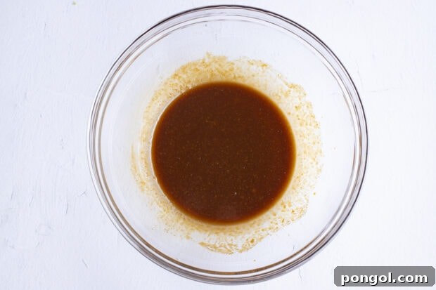 Perfect Miso Glazed Salmon 6 Miso marinade in a large glass bowl, showing the consistency of the mixture.