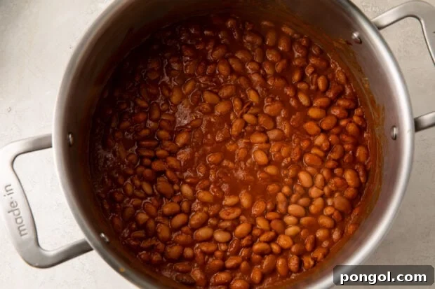 Smoky Rancher's Beans 7 Ranch style beans in tomato puree in large pot