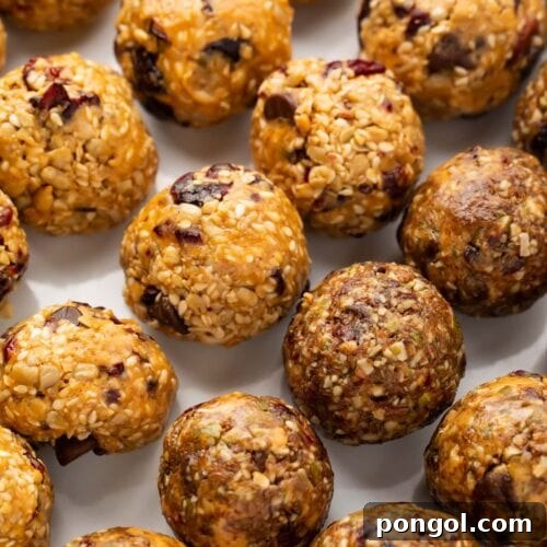 Rows of seed cycling balls on parchment paper