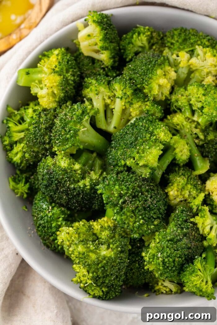 Instant Pot broccoli in a white bowl