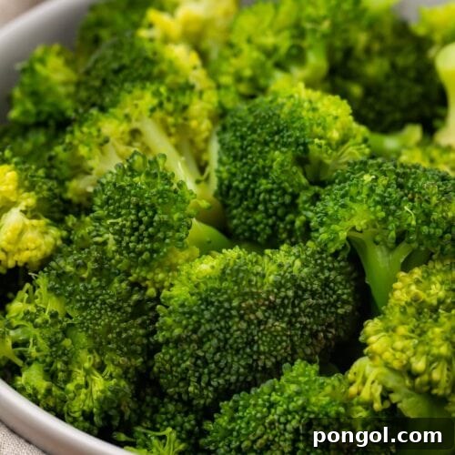 Instant Pot broccoli in a white bowl