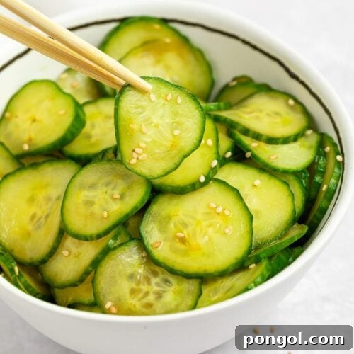 japanese cucumber salad in a bowl with chopsticks