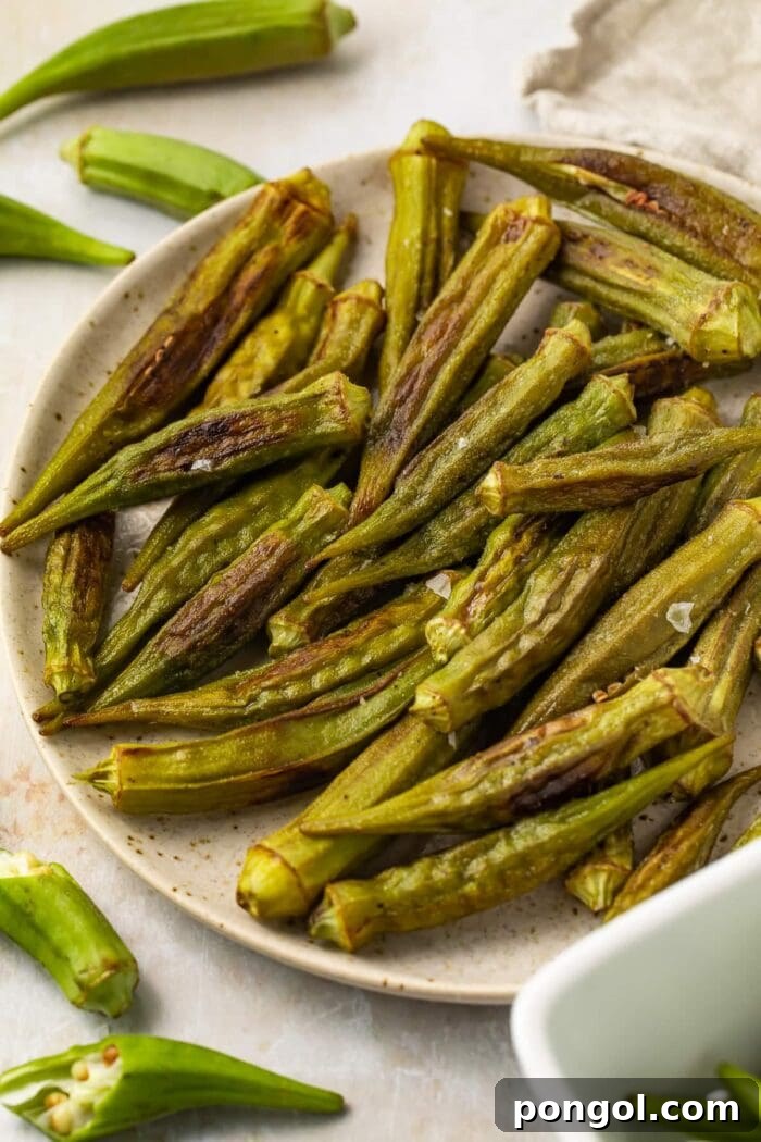 Lightly roasted okra in a large bowl