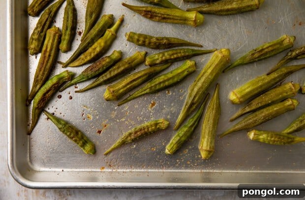 Roasted okra on baking sheet