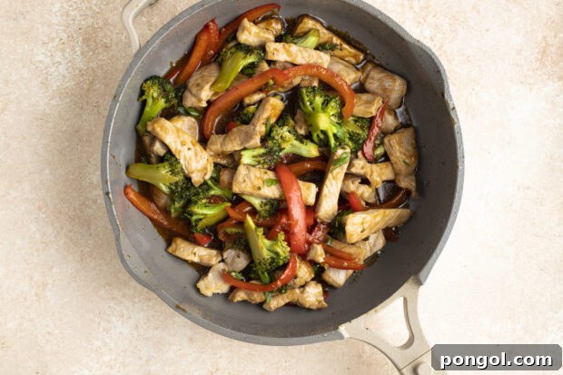 Pork stir fry in large skillet