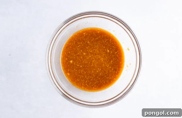 Sauce for Mandarin chicken in a small glass bowl