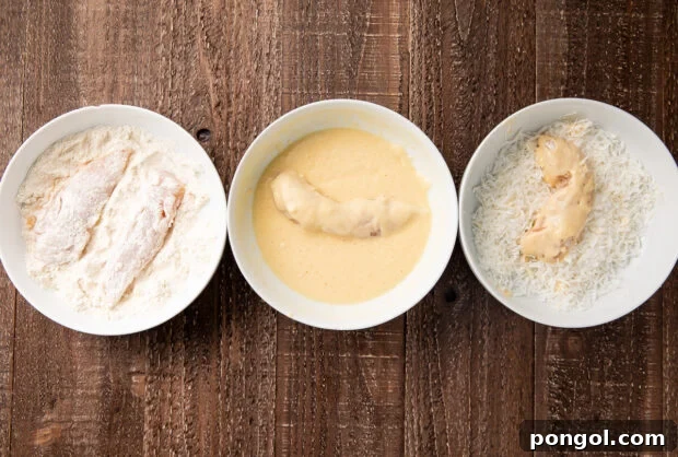 Golden Coconut Chicken with a Zingy Orange-Horseradish Glaze 7 Bowls with layers for coconut chicken strips