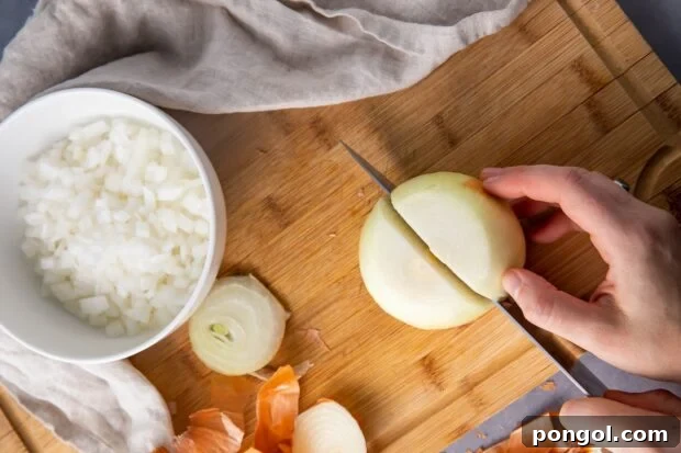 Slice the onion in half from top to bottom