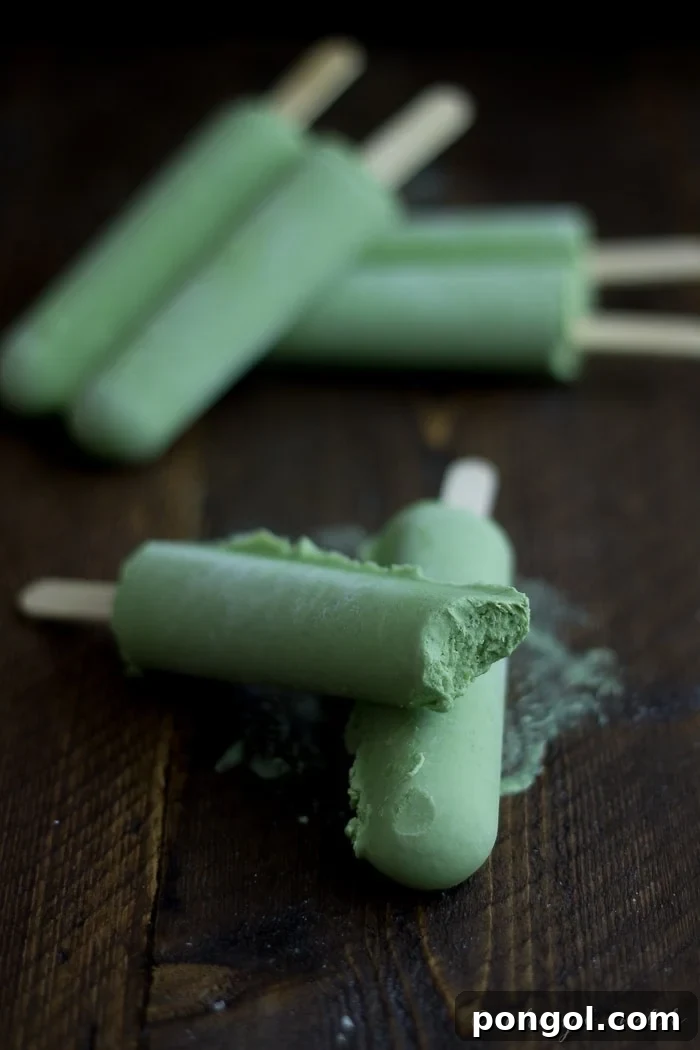 Green Tea Coconut Popsicles. The perfect creamy summer treat – requiring only a few minutes of prep time! Delicious and refreshing.