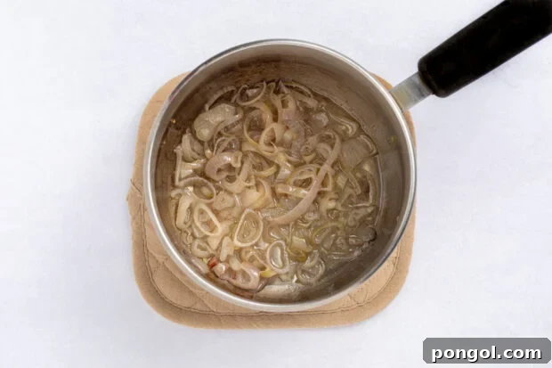 Warm Bacon Vinaigrette 7 Sautéing chopped shallots in reserved bacon fat in a saucepan