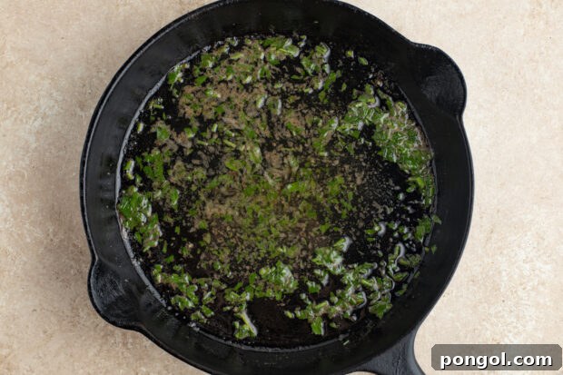 Butter, lemon juice, and parsley in a cast iron skillet