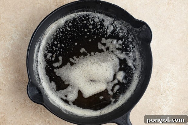Melted butter in cast iron skillet
