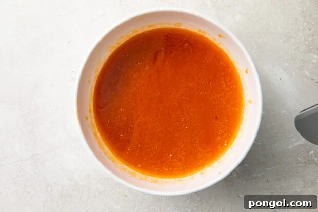 Ultimate Air Fryer Frozen Buffalo Wings 7 Hot sauce and butter mixture for air fryer chicken wings