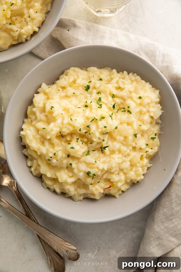 Overhead photo of Instant Pot risotto in a neutral bowl, ready to be served