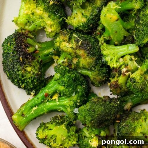 Sautéed Broccoli Florets 4 Sauteed broccoli on a white plate