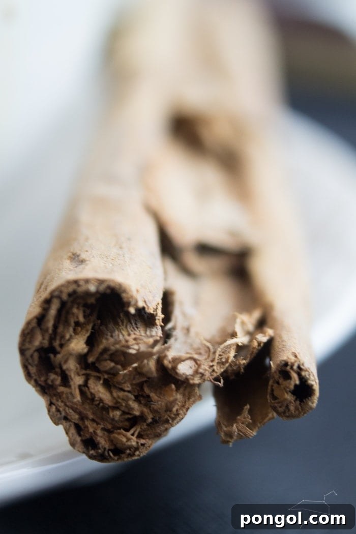 Cozy Vegan Pumpkin Delight 7 Homemade Vegan Pumpkin Spice Latte in a festive mug, showing its cost-effectiveness compared to coffee shops.