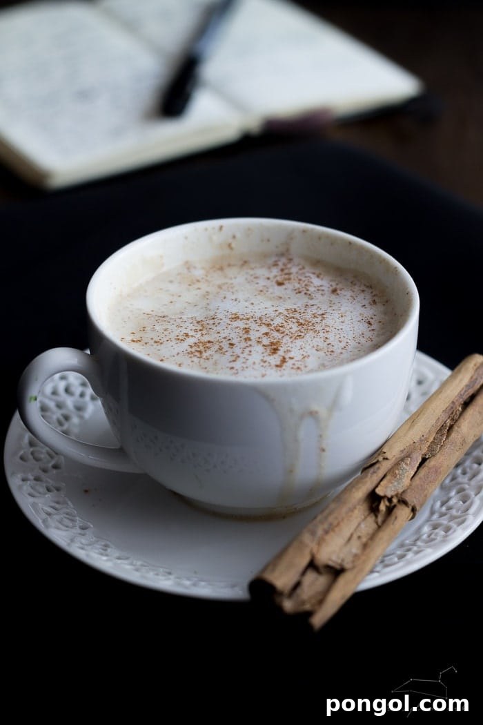 Cozy Vegan Pumpkin Delight 8 The golden-brown color of the homemade pumpkin spice syrup, ready to be infused into lattes.