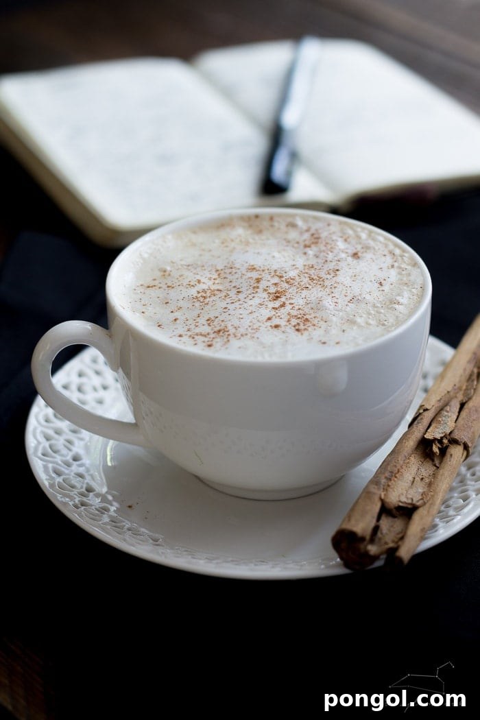 Cozy Vegan Pumpkin Delight 9 Ingredients for Vegan Pumpkin Spice Latte laid out, emphasizing natural and wholesome components.