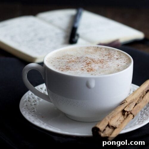 Cozy Vegan Pumpkin Delight 10 Freshly prepared Vegan Pumpkin Spice Latte, ready to be enjoyed.