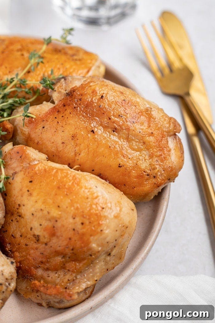 Perfectly cooked Sous Vide Chicken Thighs with crispy skin.