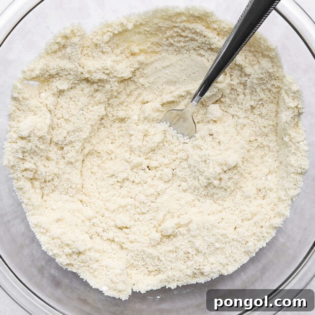 Decadent Keto Pecan Pie 4 Mixing dry ingredients for keto pie crust