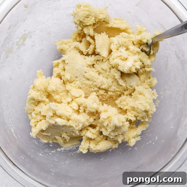 Decadent Keto Pecan Pie 6 Pressing keto pie dough into a pie pan