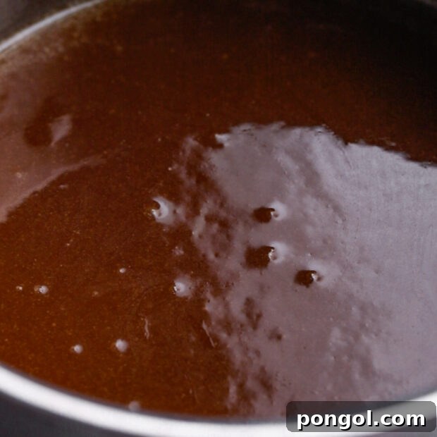 Decadent Keto Pecan Pie 7 Melting butter and brown Swerve for keto pecan pie filling