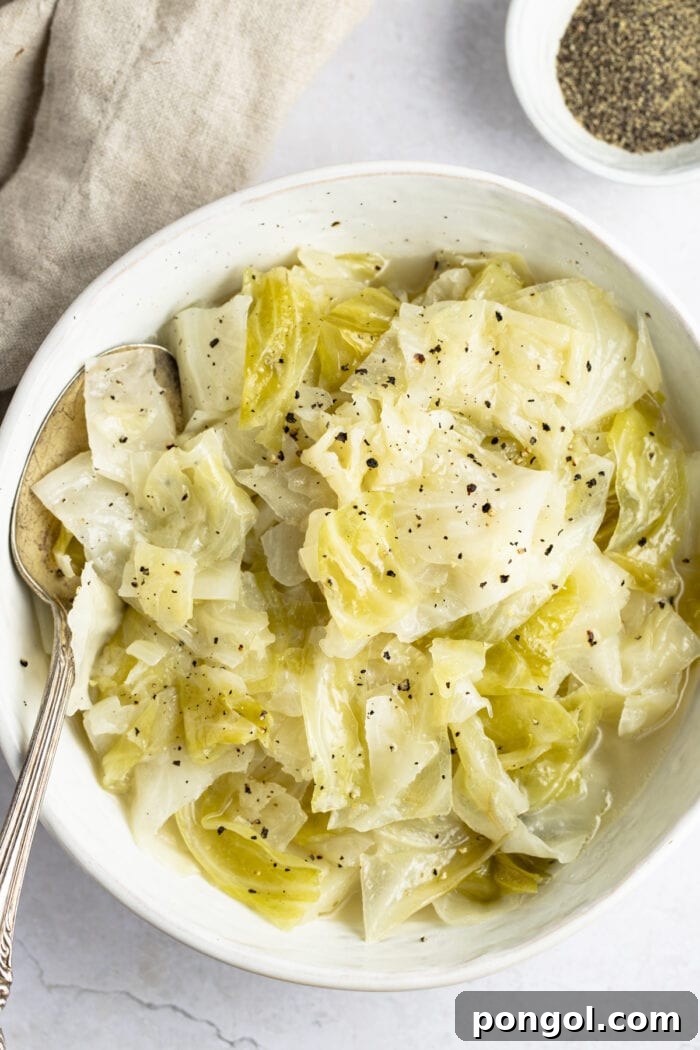 Overhead view of Instant Pot cabbage in a white bowl