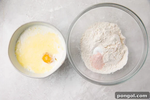 Two bowls, one with dry ingredients and one with ingredients for blini