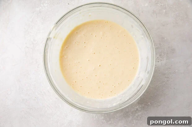 Blini batter in large glass bowl