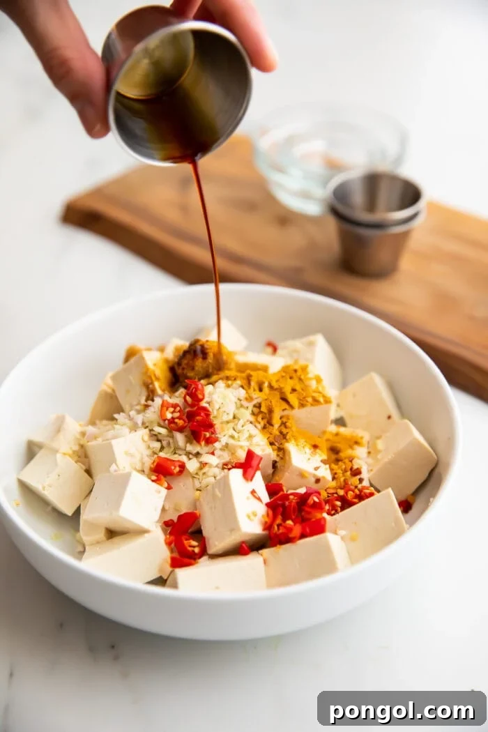 Agave-Sweetened Lemongrass Tofu with Thai Chili Fire 3 Lemongrass tofu marinade poured over tofu in a large bowl