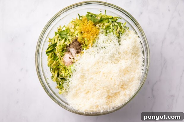 Ingredients for Brussels sprouts salad in a large glass bowl, ready to be mixed