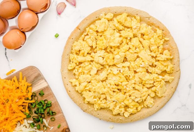 Scrambled eggs on pizza crust
