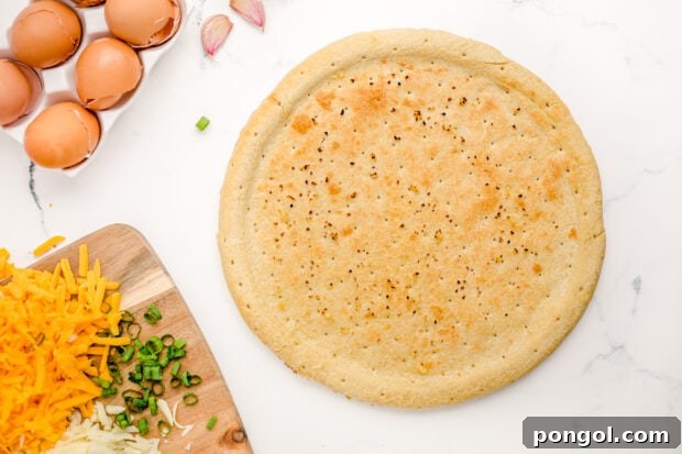 Golden pizza crust on countertop