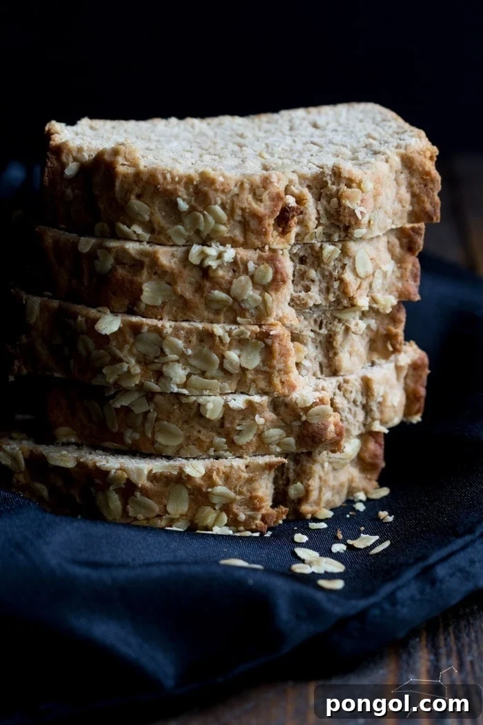Freshly baked whole wheat beer bread loaf, cooling on a rack