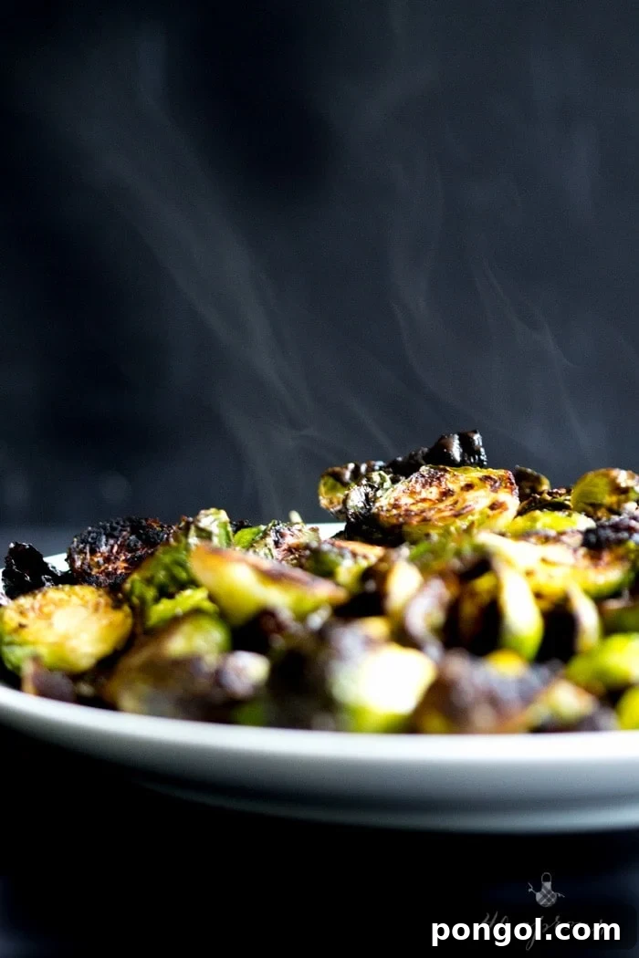 Crispy miso roasted brussel sprouts - in a miso, white wine, and butter sauce, these brussel sprouts are crazy good and so simple! Perfect for Thanksgiving