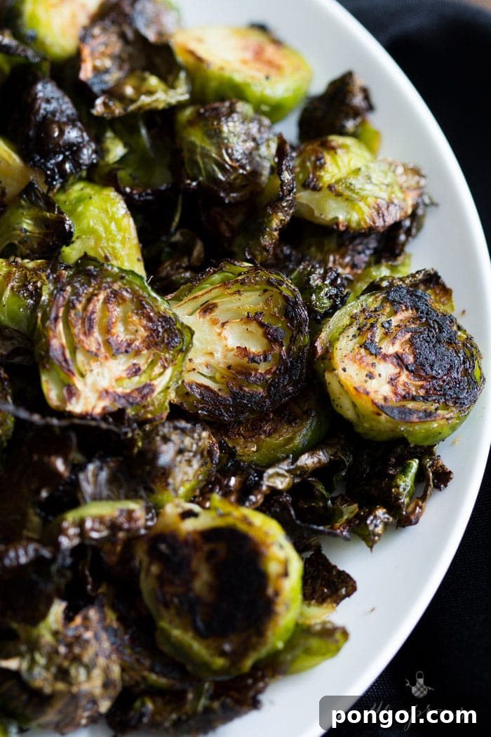 Crispy miso roasted brussel sprouts - in a miso, white wine, and butter sauce, these brussel sprouts are crazy good and so simple! Perfect for Thanksgiving