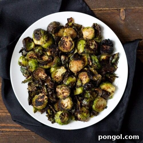 Crispy miso roasted brussel sprouts - in a miso, white wine, and butter sauce, these brussel sprouts are crazy good and so simple! Perfect for Thanksgiving