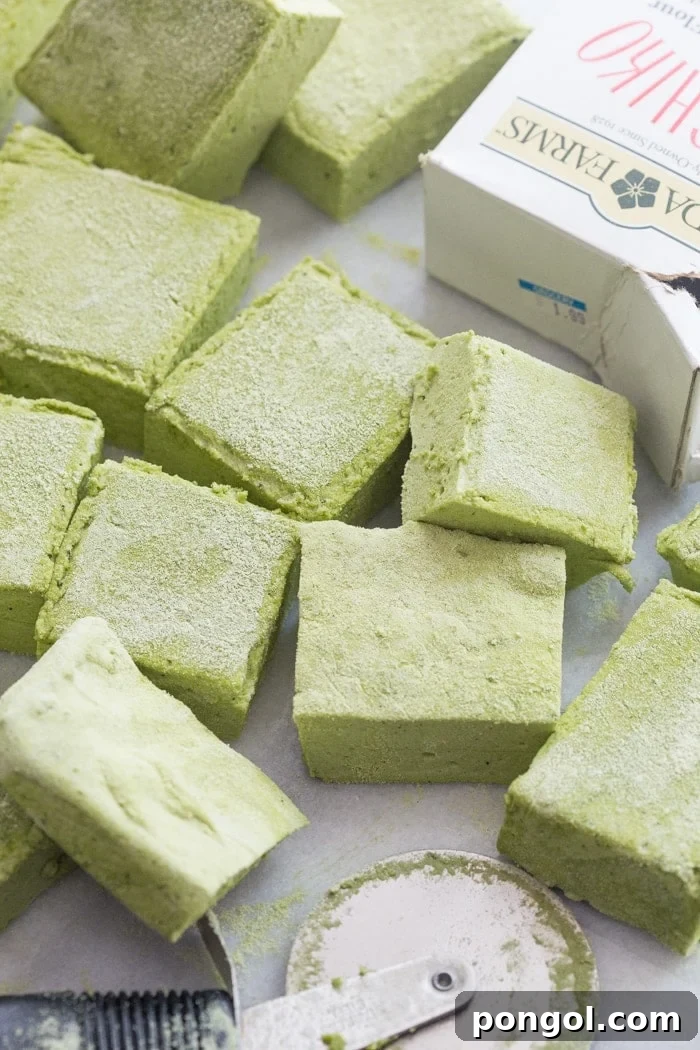 A tray of freshly made Matcha Marshmallows, ready to be cut into perfect squares.