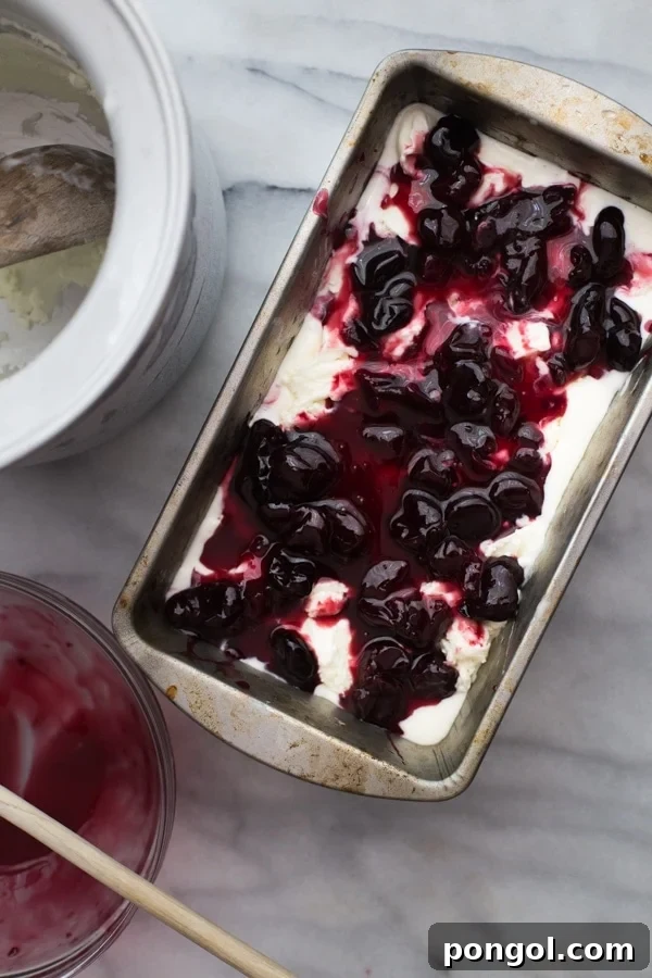 Rich goat cheese and roasted cherry ice cream, a delightful dessert. Jeni's recipe recreated at home.