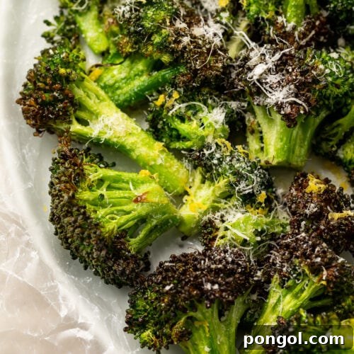Overhead view of air fryer broccoli on a plate
