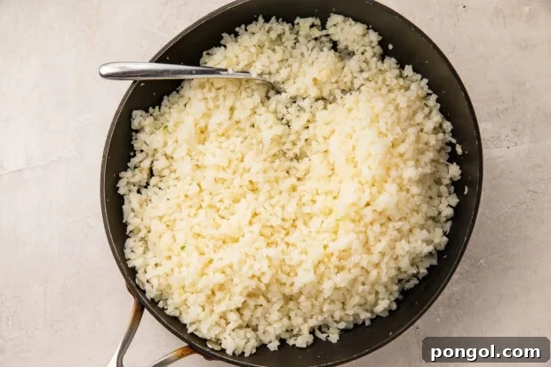 Cauliflower rice in large skillet