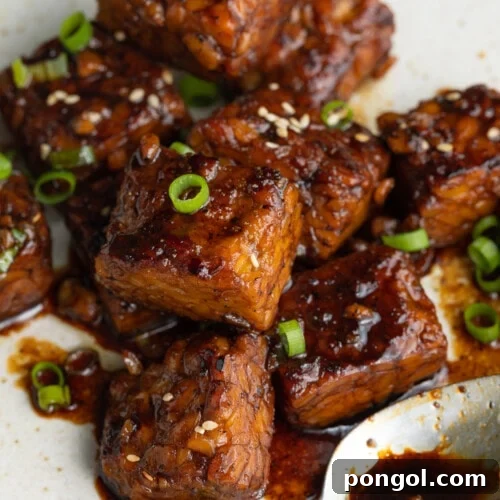 close-up image of cooked tempeh on a plate