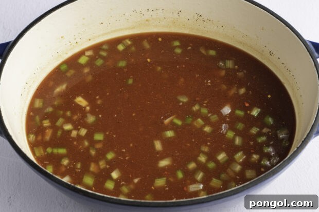 Veggies and broth in dutch oven