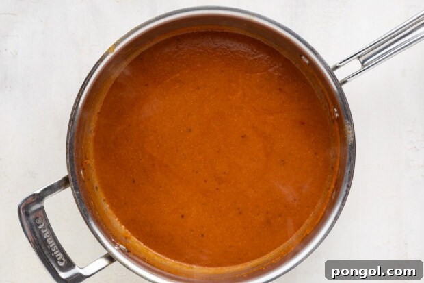 Flavor Packed Vegan Enchiladas 6 enchilada sauce simmering