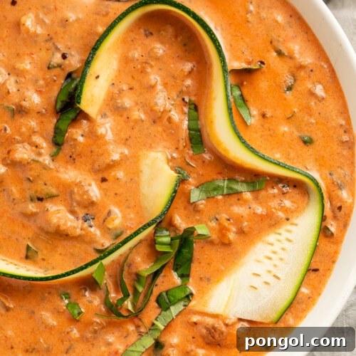 Overhead view of Whole30 lasagna soup in a bowl with a spoon
