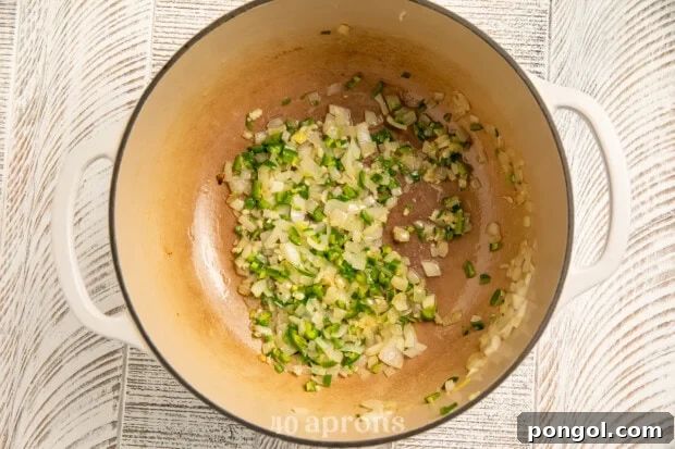 Onion and jalapeño in large pot