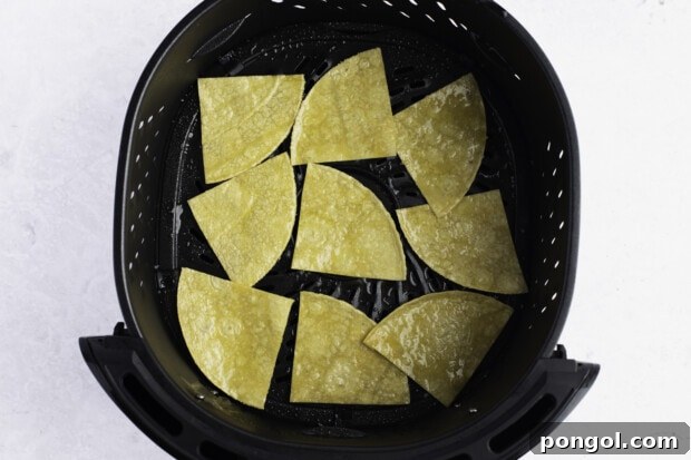 Tortilla chips in air fryer basket