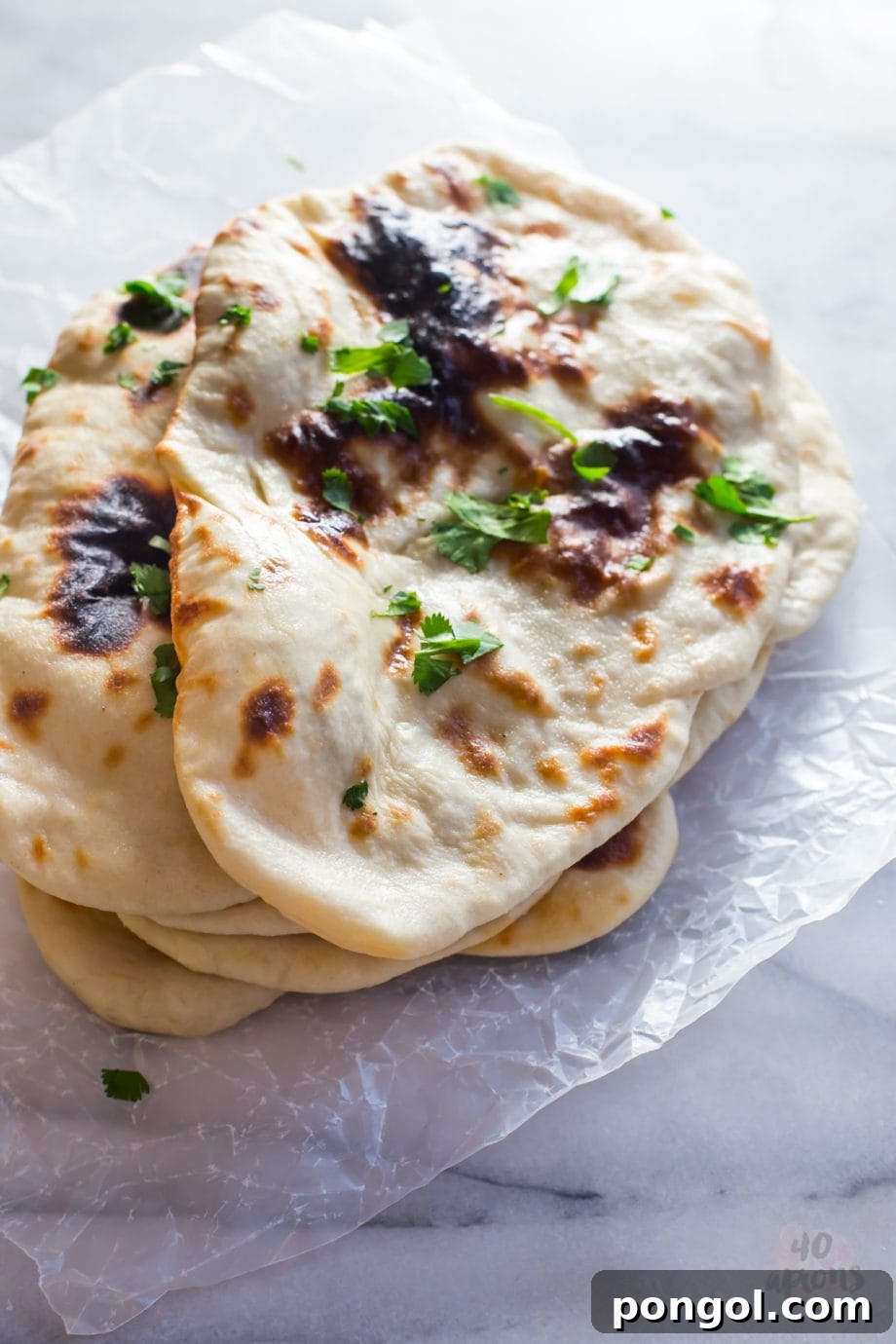 Perfect homemade naan, chewy and tender, a delightful accompaniment to any Indian dish.